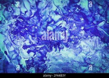 Blue and green abstract paint background, texture art.Marble background.floating colored ink on water. Stock Photo