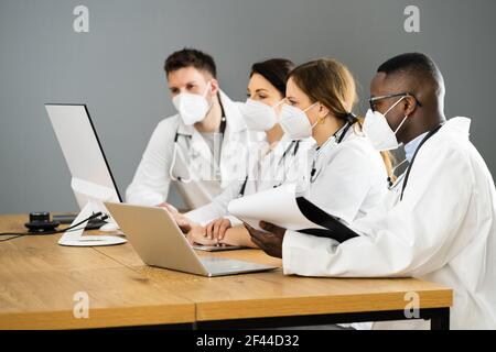 Physician Medical Doctor Training Diverse Group In Face Mask Stock Photo
