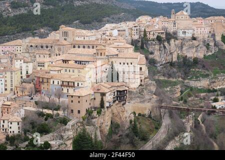 View of Hanged Houses (Casas Colgadas) and San Pablo bridge in Cuenca (Spain) taking from a hill. Stock Photo