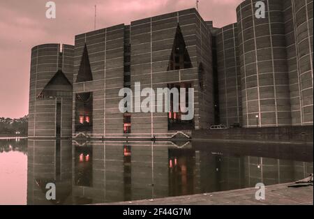 Grand building of Bangladesh National Parliament or Jatiya Sangsad Bhaban, located at Sher-e-Bangla Nagar. Design by architect Louis Kahn . Stock Photo