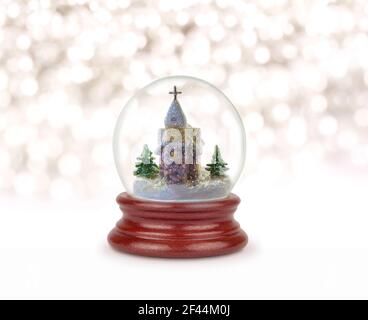 Christmas snow ball or glass globe. Snowman with gifts. Can be used as a Christmas or a New Year gift or symbol. Stock Photo