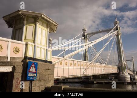 A colourful tollbooth on the Albert Bridge, Chelsea, London, England, UK Stock Photo