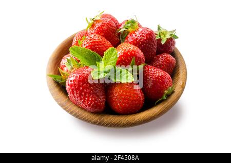 Strawberries in bowl isolated on white background. Ripe strawberries close-up. Background berry. Sweet and juicy berry with copy space for text. Straw Stock Photo