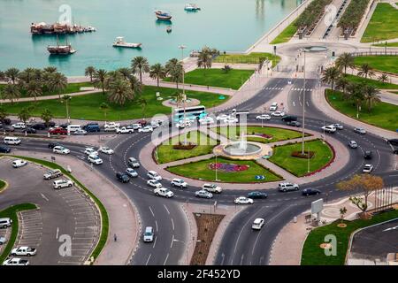 Qatar, Doha, Traffic at roundabout infont of the Museum of Islamic Art Stock Photo