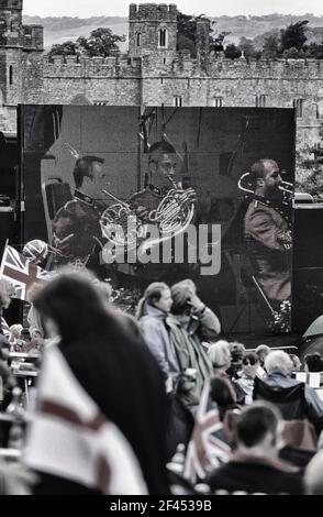 Large digital screen display at an outdoor summer concert at Leeds Castle. Kent. England. UK Stock Photo