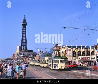 Three heritage trams on the promenade. Blackpool, Lancashire, England, UK Stock Photo