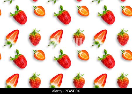 Fresh ripe strawberries seamless pattern. Strawberries and strawberry slices isolated on white background. Top view. Banner. Stock Photo