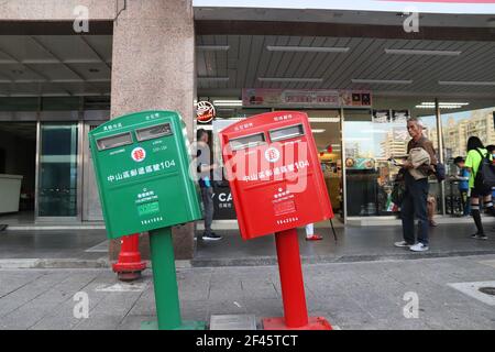 TAIPEI, TAIWAN - DECEMBER 4, 2018: Post boxes bent during typhoon in Taipei, Taiwan. The twisted mailboxes are a popular local landmark. Stock Photo