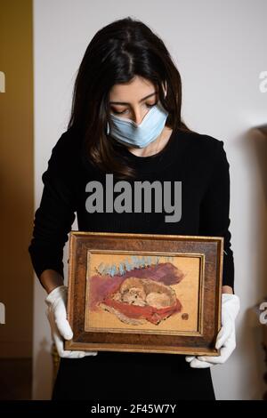 London, UK. 19 March 2021. A Sotheby's employee holds a painting from the Collection of Patricia Knatchbull, 2nd Countess Mountbatten of Burma, to be auctioned at Sotheby’s in London on 24 March.  Picture date: Friday March 19, 2021. Photo credit should read: Matt Crossick/Empics/Alamy Live News Stock Photo