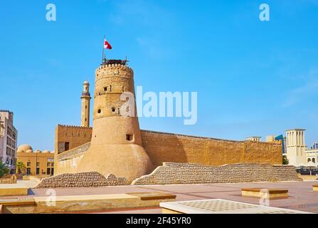 The scenic adobe watchtower of Al Fahidi Fort, the oldest building of Dubai, and the perfect example of local medieval defensive architecture, UAE Stock Photo