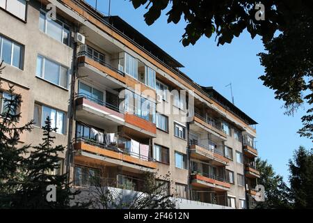 Vidin city, Bulgaria. Old concrete apartment building. Dilapidated residential architecture. Stock Photo