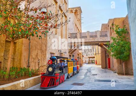 DUBAI, UAE - MARCH 8, 2020: The tourist train is the perfect choice to explore old Al Fahidi neighborhood, on March 8 in Dubai Stock Photo