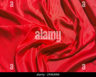 Texture of red Wrinkles fabric for background. Valentines Day or Christmas Day wallpaper design Stock Photo