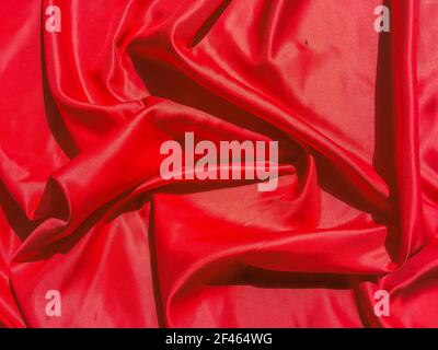 Texture of red Wrinkles fabric for background. Valentines Day or Christmas Day wallpaper design Stock Photo