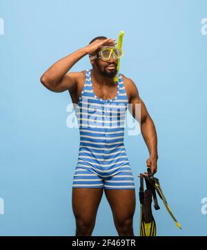 Swimming costume and sale goggles