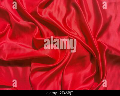 Texture of red Wrinkles fabric for background. Valentines Day or Christmas Day wallpaper design Stock Photo