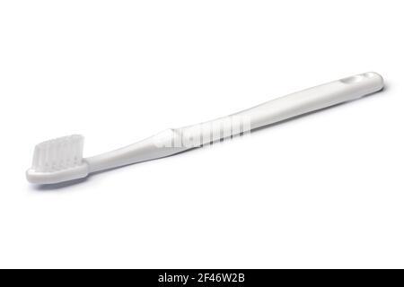 Single plastic tooth brush isolated on white background Stock Photo