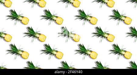 Seamless pattern of fresh ripe pineapple halves isolated on white background. Top view. Exotic tropical fruit summer concept Stock Photo