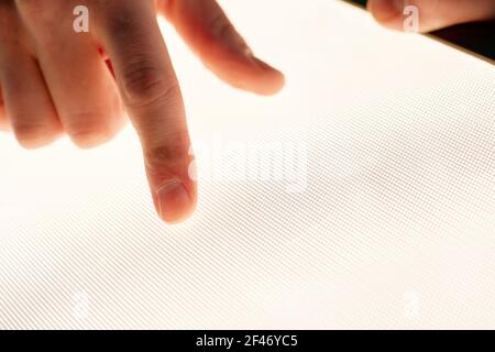 close-up. young man using a graphic tablet. Stock Photo