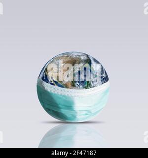 Planet Earth with face mask protect. World medical concept. Elements of this image furnished by NASA. Stock Photo