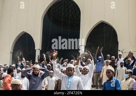 Dhaka, Bangladesh. 19th Mar, 2021. Protesters chant slogans during the protest.Bangladeshis raise their footwear and shout slogans during a protest after Friday prayers, against the visit of Indian Prime Minister Narendra Modi in Dhaka, Bangladesh, Modi is expected to visit Bangladesh on 26 march to attend the 50th anniversary of Independence Day of Bangladesh as well as the 100th birth anniversary of the country's first president Sheikh Mujibur Rahman. (Photo by Sazzad Hossain/SOPA Images/Sipa USA) Credit: Sipa USA/Alamy Live News Stock Photo