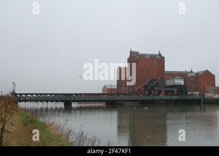 GRIMSBY, ENGLAND - March 19th: A general view of the Corporation Bridge and Victoria Flour Mill. March 19th, 2021 in Grimsby, England. (Photo by Ashley Allen/Alamy Live News) Stock Photo