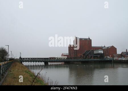 GRIMSBY, ENGLAND - March 19th: A general view of the historic Corporation Bridge and Victoria Flour Mill. March 19th, 2021 in Grimsby, England. (Photo by Ashley Allen/Alamy Live News) Stock Photo