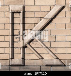 Uppercase letter K composed of light clinker Stock Photo