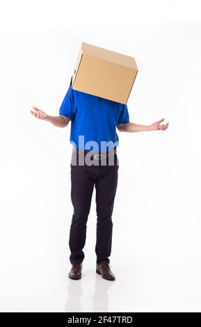 man in a bluer T-shirt with a cardboard box on his head makes a gesture ...