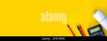 Electrical installation measuring instruments tools on a yellow background with copy space. place for text. Selective focus Stock Photo