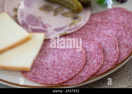 charcuterie and raclette cheese Stock Photo