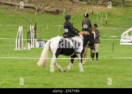 Young riders and their ponies competing in the gymkhana at the annual Ceiriog Valley agricultural show and sheepdog trials in Glyn Ceiriog North Wales Stock Photo