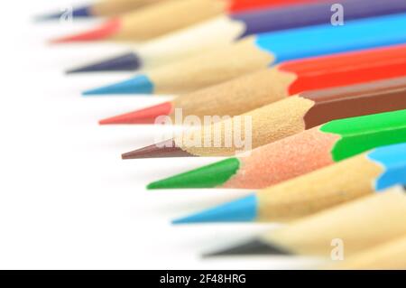 Set of color pencils isolated on a white. Macro shot. Selective focus. Stock Photo