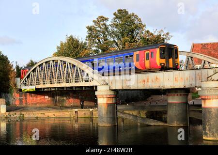 156404 East Midlands Railway Regional, on the river Witham bridge, Boston town, Lincolnshire County, England, UK Stock Photo