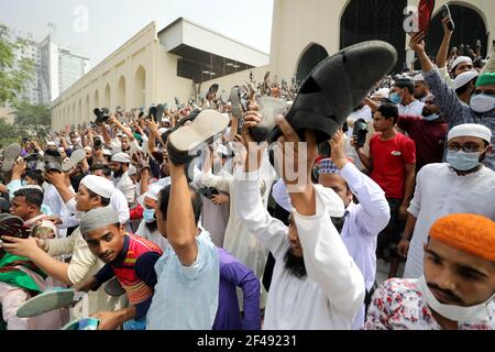 Dhaka, Dhaka, Bangladesh. 19th Mar, 2021. March, 19, 2021 Bangladeshi protesters raise their footwear and shout slogans during a protest after Friday prayers, against the visit of Indian Prime Minister Narendra Modi in Dhaka, Bangladesh Credit: Harun-Or-Rashid/ZUMA Wire/Alamy Live News Stock Photo