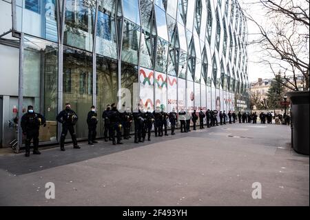 Paris, France. 19th Mar 2021. CRS line up in front of the Necker Hospital during the climate march in Paris on 19 March 2021. Credit: Nathan Claux/Alamy Live News Stock Photo