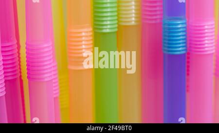 Close up of multicolored cocktail tubes, camera movement Stock Photo