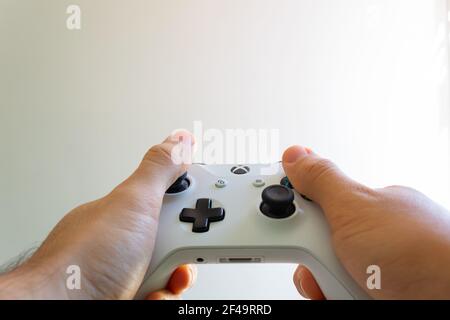 Redmond, Washington, United States - March 17 2021: Xbox control trend in the growth of video game users Stock Photo