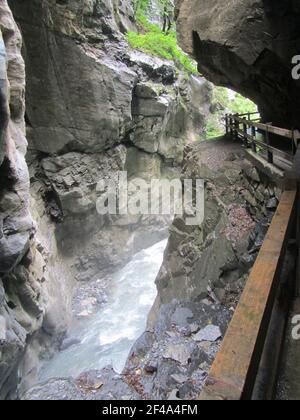 The Tamina ravine is a thermal spring in the canton of St. Gallen, Swiss. It was former the thermal bath of Pfaefers, now the water spends Bad Ragaz. Stock Photo