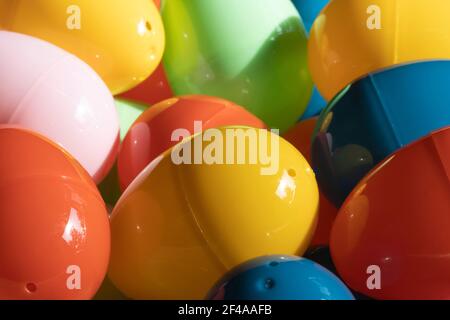 Colorful plastic Easter eggs in the sun. Stock Photo