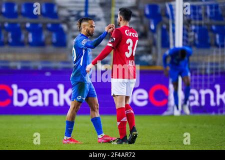 GENK, BELGIUM - MARCH 19: Theo Bongonda of KRC Genk and Konstantinos Laifis of Standard de Liege during the Jupiler Pro League match between KRC Genk Stock Photo