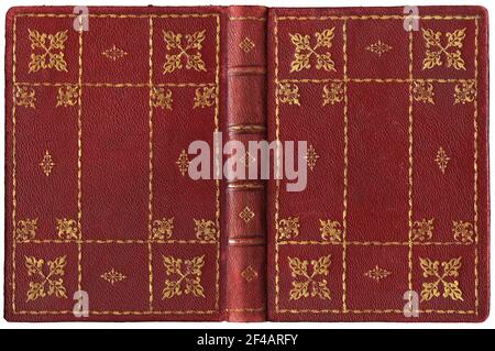 Old open book in textured red leather cover with floral and abstract embossed golden decorations, isolated on white, nice details Stock Photo