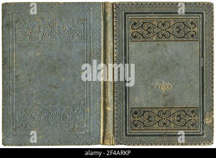 Old open book cover in gray canvas with embossed golden abstract and floral decorations (circa 1880), isolated on white, beautiful details Stock Photo