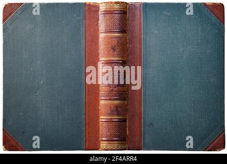 Old open book cover with embossed leather spine, cloth boards and abstract golden geometric decorations - circa 1909 - isolated on white Stock Photo