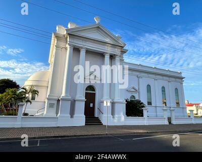 Deatil of the Doric columns and pediment of the side facade of the Holy Rosary Catholic Church, in Bundaberg, Queensland, Australia Stock Photo