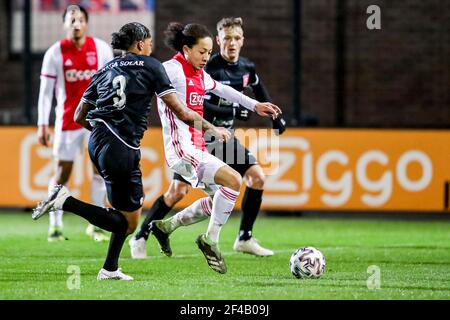 AMSTERDAM, NETHERLANDS - MARCH 19: Shermaine Martina of MVV Maastricht, Kian Fitz Jim of Ajax U23 during the Dutch Keukenkampioendivisie match between Stock Photo