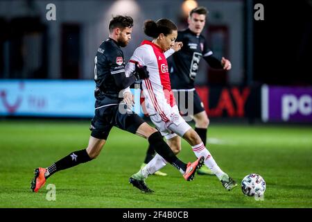 AMSTERDAM, NETHERLANDS - MARCH 19: Thibaut van Acker of MVV Maastricht, Kian Fitz Jim of Ajax U23 during the Dutch Keukenkampioendivisie match between Stock Photo