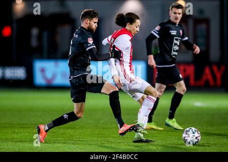 AMSTERDAM, NETHERLANDS - MARCH 19: Thibaut van Acker of MVV Maastricht, Kian Fitz Jim of Ajax U23 during the Dutch Keukenkampioendivisie match between Stock Photo