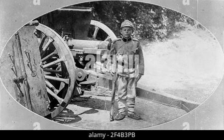 Serbian child soldier in uniform during World War I ca. 1914-1915 Stock Photo