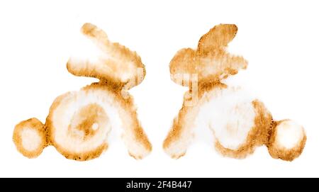 Two watercolor rabbit silhouette facing each other. Abstract brown bunny stamp or coffee stain illustration. Egg wash Easter bunny leftovers on parchm Stock Photo